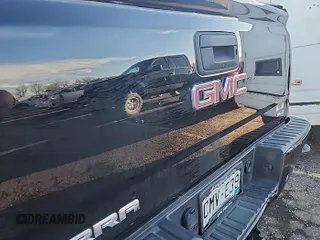 2018 GMC Sierra 1500 SLE z VIN 1GTV2MEC7JZ355593, wystawiony jako IAAI lot #42575783 z przebiegiem 172 588 mil mil oraz . Historia ofert i sprzedaży dostępna na DreamBid. Obrazek 7.