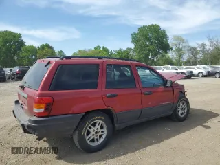 2004 Jeep Grand Cherokee Laredo z VIN 1J4GW48S24C220989, wystawiony jako Copart lot #56759465 z przebiegiem 227 612 mil mil oraz Szkoda całkowita • Salvage title. Historia ofert i sprzedaży dostępna na DreamBid. Obrazek 3.