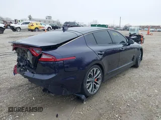 2020 Kia Stinger GT with VIN KNAE35LC4L6084421, listed as a IAAI auction lot 41697896 with 51,191 mi miles. Bid and sale history available at carsss.com. Image 4.