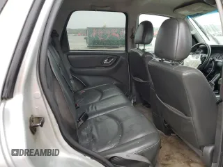 2006 Mazda Tribute i with VIN 4F2YZ02Z26KM14821, listed as a Copart auction lot 71718434 with 318,841 mi miles and Salvage Title. Bid and sale history available at carsss.com. Image 11.