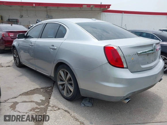 2009 Lincoln MKS с VIN 1LNHM94R99G611617, выставлен на аукционе IAAI как лот 42288299 с пробегом 115 320 миль миль и . История ставок и продаж доступна на DreamBid. Изображение 3.