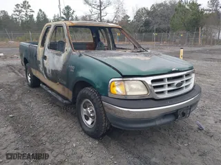 1999 Ford F-150 Work Series with VIN 1FTRX17W1XNB99012, listed as a IAAI auction lot 41412216 with 1 mi miles. Bid and sale history available at carsss.com. Image 1.