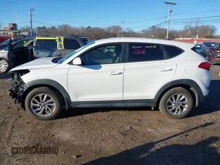 2017 Hyundai Tucson SE with VIN KM8J23A47HU291596, listed as a IAAI auction lot 41289118 with 55,876 mi miles and . Bid and sale history available at DreamBid. Image 14.
