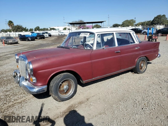 1966 Mercedes-Benz E with VIN 110C1012157487, listed as a Copart auction lot 81770344 with 68,662 mi miles and Salvage Title. Bid and sale history available at DreamBid. Image 1.