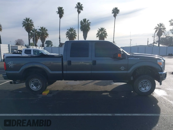 2015 Ford Super Duty F-250 SRW Lariat with VIN 1FT7W2BT9FEC45987, listed as a IAAI auction lot 41814095 with 112,806 mi miles. Bid and sale history available at carsss.com. Image 14.