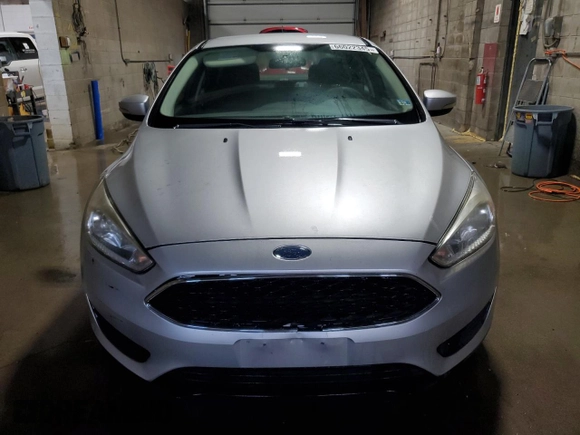 2017 Ford Focus SE with VIN 1FADP3F29HL223970, listed as a Copart auction lot 66022345 with 104,601 mi miles and Clean title. Bid and sale history available at DreamBid. Image 5.