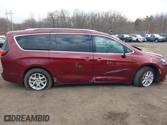 2021 Chrysler Pacifica Touring L with VIN 2C4RC1BG6MR597911, listed as a IAAI auction lot 41660729 with 72,004 mi miles and . Bid and sale history available at DreamBid. Image 13.