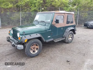 1999 Jeep Wrangler SE with VIN 1J4FY29P9XP467850, listed as a IAAI auction lot 42029322 with 250,884 mi miles. Bid and sale history available at carsss.com. Image 2.