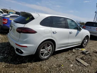 2016 Porsche Cayenne GTS with VIN WP1AD2A20GLA76331, listed as a Copart auction lot 49819255 with 39,040 mi miles and Salvage title. Bid and sale history available at DreamBid. Image 3.