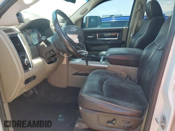 2012 Ram 2500 Laramie Limited с VIN 3C6UD5PL8CG106271, выставлен на аукционе Copart как лот 61830425 с пробегом 124 512 миль миль и Списание • Salvage title. История ставок и продаж доступна на DreamBid. Изображение 7.