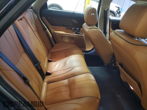 2014 Jaguar XJ Portfolio with VIN SAJWJ2GD7E8V67473, listed as a Copart auction lot 43968705 with 99,146 mi miles and Salvage title. Bid and sale history available at DreamBid. Image 10.
