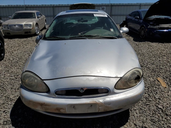1996 Mercury Sable LS with VIN 1MELM53S4TG634577, listed as a Copart auction lot 61707733 with 76,781 mi miles and Salvage Title. Bid and sale history available at carsss.com. Image 5.