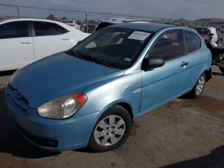 2007 Hyundai Accent GS with VIN KMHCM36C87U025960, listed as a IAAI auction lot 41253249 with 198,074 mi miles. Bid and sale history available at carsss.com. Image 2.