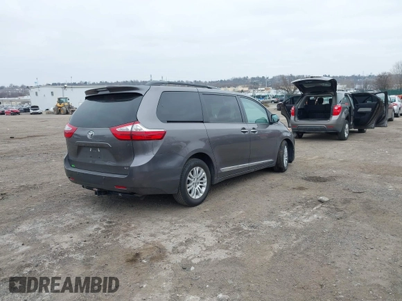 2016 Toyota Sienna XLE with VIN 5TDYK3DCXGS737846, listed as a IAAI auction lot 41782055 with 126,846 mi miles. Bid and sale history available at carsss.com. Image 4.