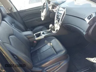 2015 Cadillac SRX with VIN 3GYFNAE35FS608595, listed as a IAAI auction lot 41282751 with 127,055 mi miles and . Bid and sale history available at DreamBid. Image 5.
