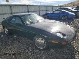 1988 Porsche 928 z VIN WP0JB0922JS860152, wystawiony jako Copart lot #77043514 z przebiegiem 78 686 mil mil oraz Tytuł czysty. Historia ofert i sprzedaży dostępna na DreamBid. Obrazek 4.