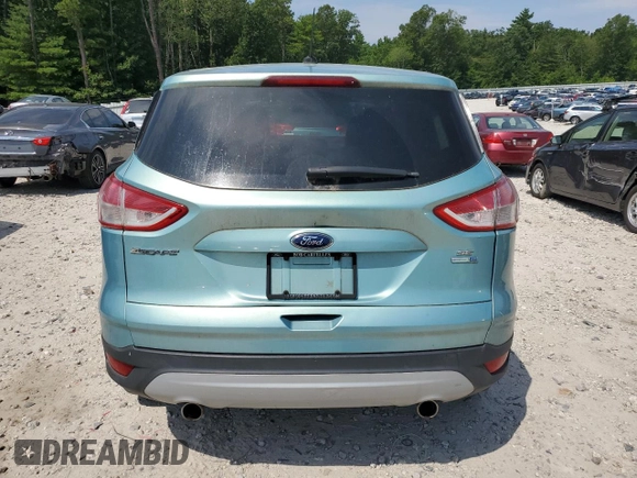 2013 Ford Escape SE z VIN 1FMCU9GX8DUC50864, wystawiony jako Copart lot #66066015 z przebiegiem 80 102 mil mil oraz Czysty tytuł • Clean title. Historia ofert i sprzedaży dostępna na DreamBid. Obrazek 6.