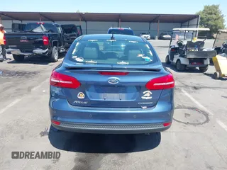 2018 Ford Focus Titanium with VIN 1FADP3J21JL323767, listed as a IAAI auction lot 42375218 with 104,440 mi miles and . Bid and sale history available at DreamBid. Image 16.