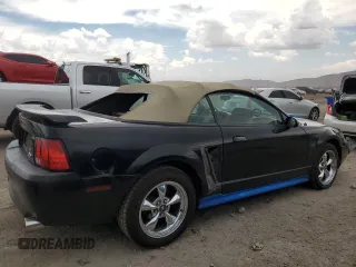 2002 Ford Mustang GT Deluxe with VIN 1FAFP45X62F162398, listed as a Copart auction lot 63150934 with 167,110 mi miles and Salvage title. Bid and sale history available at DreamBid. Image 3.