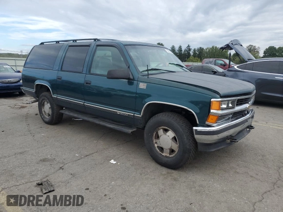 1999 Chevrolet Suburban with VIN 1GNFK16R9XJ516000, listed as a Copart auction lot 73854994 with 263,079 mi miles and Salvage Title. Bid and sale history available at carsss.com. Image 4.