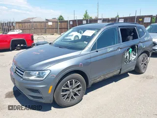 2019 Volkswagen Tiguan SE with VIN 3VV2B7AX3KM143968, listed as a IAAI auction lot 39838788 with 155,823 mi miles and . Bid and sale history available at DreamBid. Image 2.