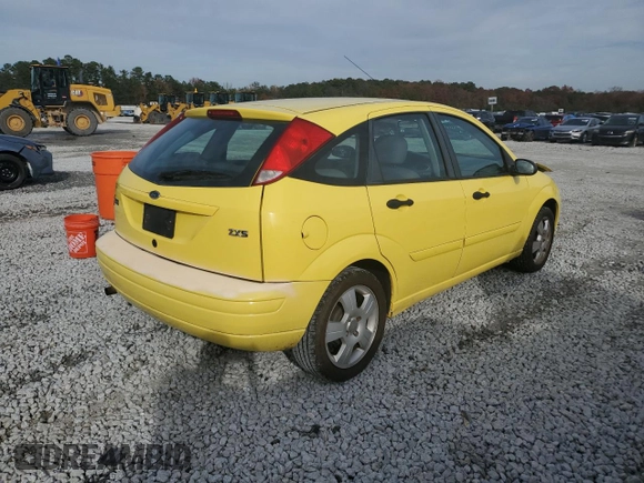 2004 Ford Focus ZX5 z VIN 3FAFP37344R117096, wystawiony jako Copart lot #82789344 z przebiegiem 188 029 mil mil oraz Szkoda całkowita • Salvage title. Historia ofert i sprzedaży dostępna na DreamBid. Obrazek 3.