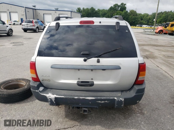 2004 Jeep Grand Cherokee Laredo z VIN 1J4GW48S14C288605, wystawiony jako Copart lot #60204815 z przebiegiem 247 816 mil mil oraz Szkoda całkowita • Salvage title. Historia ofert i sprzedaży dostępna na DreamBid. Obrazek 6.