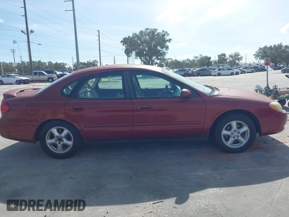 2002 Ford Taurus SES Standard with VIN 1FAFP55S42A135871, listed as a IAAI auction lot 40822596 with 185,605 mi miles. Bid and sale history available at carsss.com. Image 13.