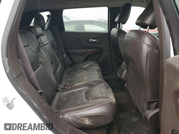 2015 Jeep Cherokee Trailhawk with VIN 1C4PJMBS9FW605075, listed as a Copart auction lot 49256195 with 103,677 mi miles and Salvage Title. Bid and sale history available at DreamBid. Image 10.