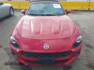 2017 FIAT 124 Spider Lusso z VIN JC1NFAEK6H0108832, wystawiony jako IAAI lot #41451223 z przebiegiem Nie podano mil oraz . Historia ofert i sprzedaży dostępna na DreamBid. Obrazek 11.