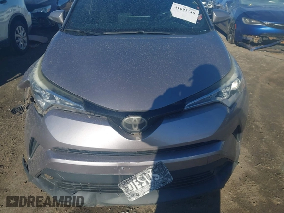 2018 Toyota C-HR XLE with VIN NMTKHMBX3JR048303, listed as a IAAI auction lot 41695246 with 125,081 mi miles. Bid and sale history available at carsss.com. Image 12.