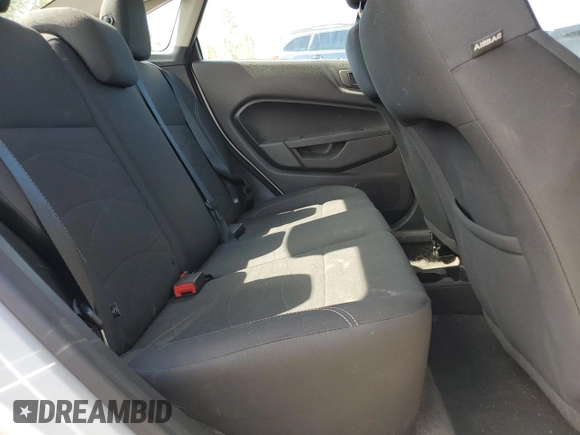 2018 Ford Fiesta SE z VIN 3FADP4BJ7JM114172, wystawiony jako Copart lot #54014805 z przebiegiem 66 828 mil mil oraz Szkoda całkowita • Salvage title. Historia ofert i sprzedaży dostępna na DreamBid. Obrazek 10.