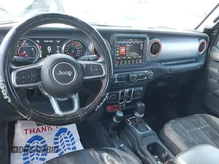2021 Jeep Gladiator Mojave with VIN 1C6JJTEG9ML528964, listed as a IAAI auction lot 41879113 with 74,315 mi miles and . Bid and sale history available at DreamBid. Image 19.