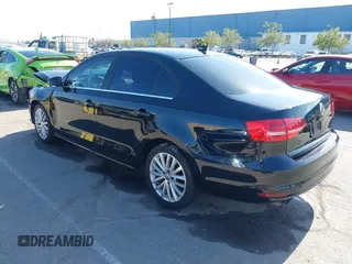 2015 Volkswagen Jetta Sedan 1.8T SE w/Connectivity with VIN 3VWD07AJ6FM354397, listed as a IAAI auction lot 41772983 with 100,265 mi miles. Bid and sale history available at carsss.com. Image 3.