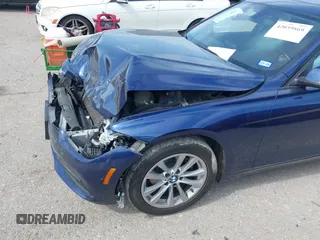 2018 BMW 3 Series 320i with VIN WBA8E1G56JNU92997, listed as a IAAI auction lot 42039869 with 105,085 mi miles. Bid and sale history available at carsss.com. Image 6.