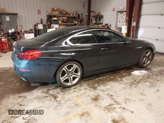 2012 BMW 6 Series 650i xDrive with VIN WBALX5C57CC894205, listed as a IAAI auction lot 41591874 with 110,932 mi miles. Bid and sale history available at carsss.com. Image 13.