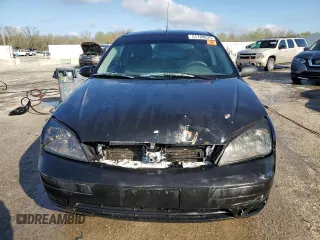 2007 Ford Focus S with VIN 1FAFP31N27W201266, listed as a Copart auction lot 51789625 with 211,274 mi miles and Salvage Title. Bid and sale history available at DreamBid. Image 5.