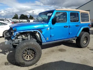 2021 Jeep Wrangler Unlimited Sahara High Altitude with VIN 1C4HJXEM3MW770622, listed as a Copart auction lot 76144874 with 71,886 mi miles and Salvage title. Bid and sale history available at DreamBid. Image 1.