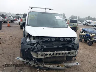 2014 Ford Transit Connect XLT z VIN NM0LS7F70E1167560, wystawiony jako IAAI lot #42511429 z przebiegiem 135 028 mil mil oraz . Historia ofert i sprzedaży dostępna na DreamBid. Obrazek 6.