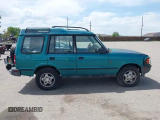 1994 Land Rover Discovery SD z VIN SALJY1247RA097510, wystawiony jako IAAI lot #42343474 z przebiegiem 137 141 mil mil oraz . Historia ofert i sprzedaży dostępna na DreamBid. Obrazek 13.