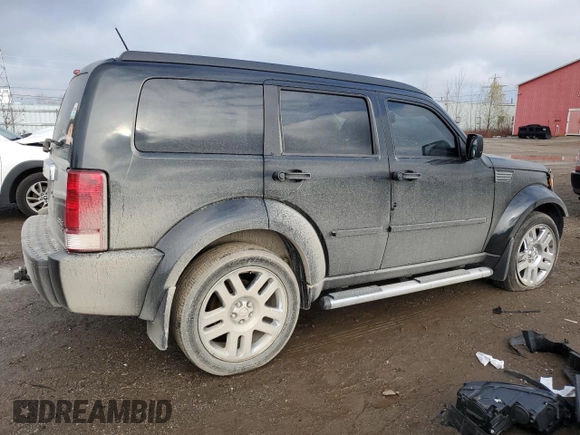 2008 Dodge Nitro R/T with VIN 1D8GU58618W245621, listed as a Copart auction lot 77798384 with 151,784 mi miles and Salvage Title. Bid and sale history available at DreamBid. Image 3.