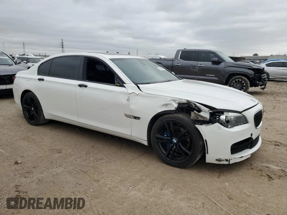 2015 BMW 7 Series 740Li with VIN WBAYE4C52FD947008, listed as a Copart auction lot 45206035 with 123,551 mi miles and Salvage Title. Bid and sale history available at DreamBid. Image 4.