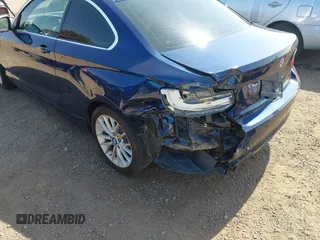2015 BMW 2 Series 228i with VIN WBA1F9C59FVW98387, listed as a IAAI auction lot 42518807 with 79,848 mi miles and . Bid and sale history available at DreamBid. Image 6.