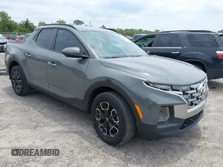 2022 Hyundai Santa Cruz SEL Premium z VIN 5NTJDDAF6NH029260, wystawiony jako IAAI lot #42205372 z przebiegiem 38 794 mil mil oraz . Historia ofert i sprzedaży dostępna na DreamBid. Obrazek 1.