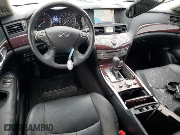 2017 Infiniti M37 with VIN JN1BY1AR0HM770663, listed as a Copart auction lot 54260265 with 126,965 mi miles and Salvage Title. Bid and sale history available at carsss.com. Image 8.