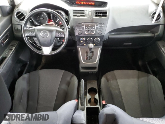 2012 Mazda 5 Touring z VIN JM1CW2CL6C0143536, wystawiony jako Copart lot #57579915 z przebiegiem 148 191 mil mil oraz Szkoda całkowita • Salvage title. Historia ofert i sprzedaży dostępna na DreamBid. Obrazek 8.