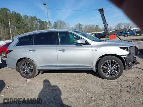 2019 Infiniti QX60 Luxe with VIN 5N1DL0MN8KC555323, listed as a IAAI auction lot 41824366 with 83,596 mi miles and . Bid and sale history available at DreamBid. Image 14.