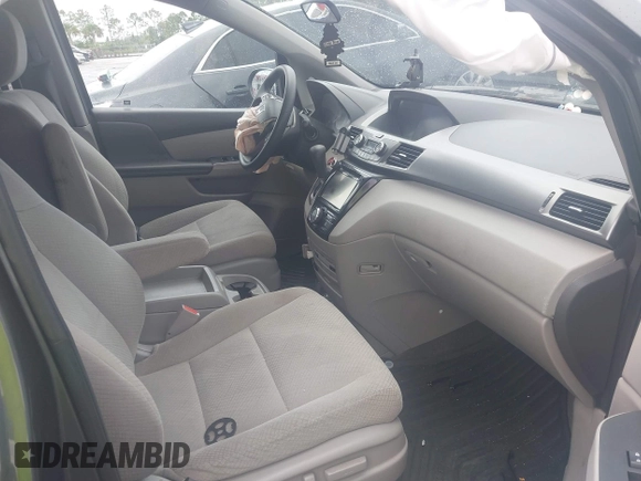 2017 Honda Odyssey SE with VIN 5FNRL5H3XHB026595, listed as a IAAI auction lot 39631978 with 92,555 mi miles and . Bid and sale history available at carsss.com. Image 5.