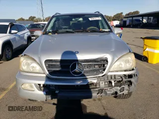 2002 Mercedes-Benz M-Class with VIN 4JGAB54E62A297849, listed as a Copart auction lot 83912114 with 240,479 mi miles and Salvage Title. Bid and sale history available at carsss.com. Image 5.
