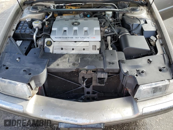 2000 Cadillac Eldorado z VIN 1G6EL12Y7YB703863, wystawiony jako Copart lot #85433244 z przebiegiem 175 416 mil mil oraz Szkoda całkowita • Salvage title. Historia ofert i sprzedaży dostępna na DreamBid. Obrazek 11.